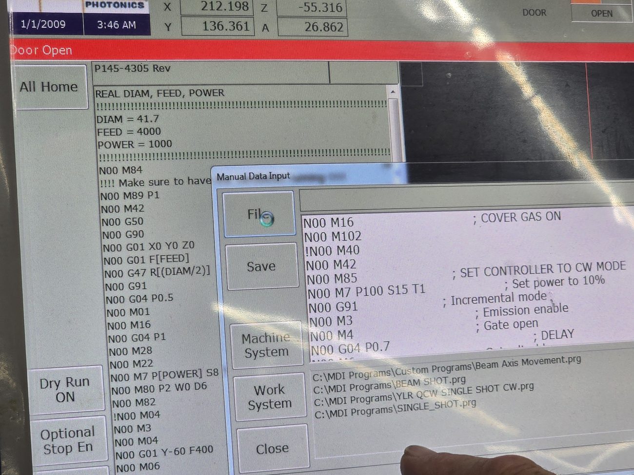 The machine HMI with the loaded program showing DIAM 41.7, FEED 4000 and POWER.