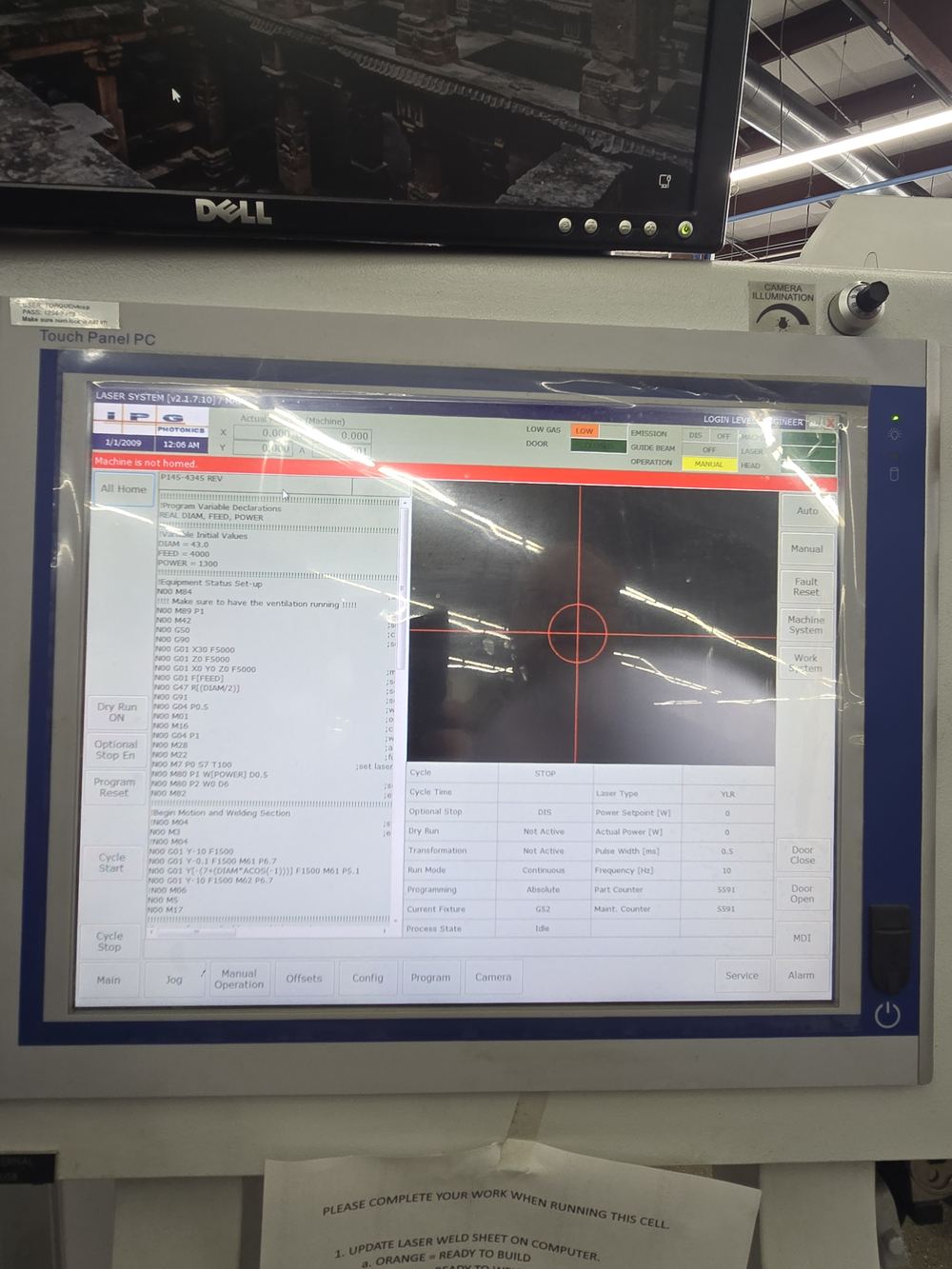 The touch panel showing a red bar reading Machine is not homed.